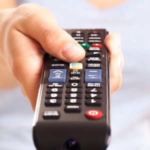 tv-console-woman-s-hand